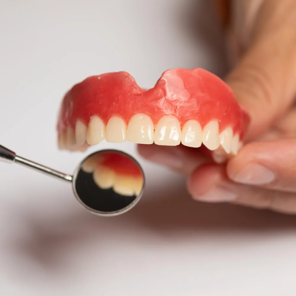 Dentist performing white fillings procedure