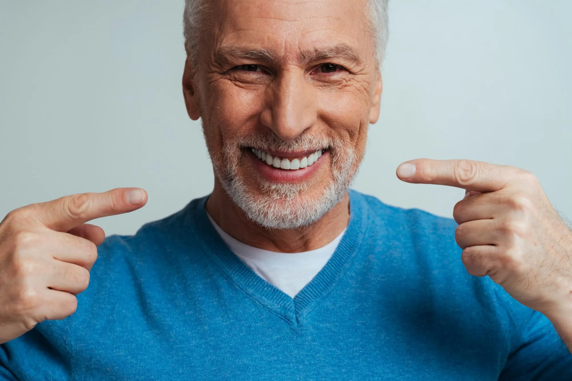Dentist performing dentures procedure