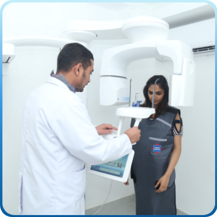 A dentist helping woman with CBCT Scanning machine