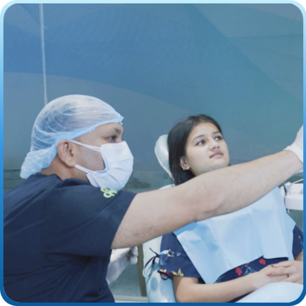 Dentist guiding a girl with General Dentistry